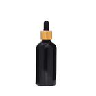 15ml 30ml 50ml Black Glass Dropper Vial Bottles With Bamboo Lid ODM